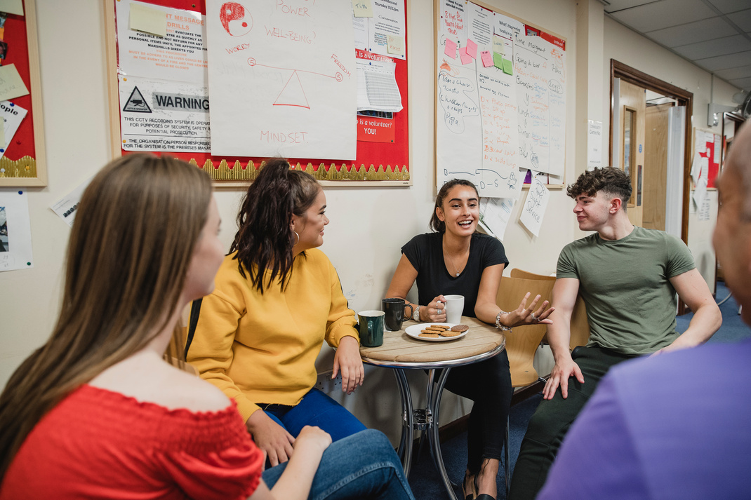 Teenagers Relaxing with Tea at Youth Club